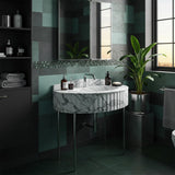 Carrara marble fluted console sink with integrated backsplash and sleek minimalist metal stand.