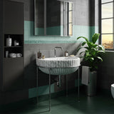 Carrara marble semicircular fluted console sink with minimalist metal stand for modern bathrooms.