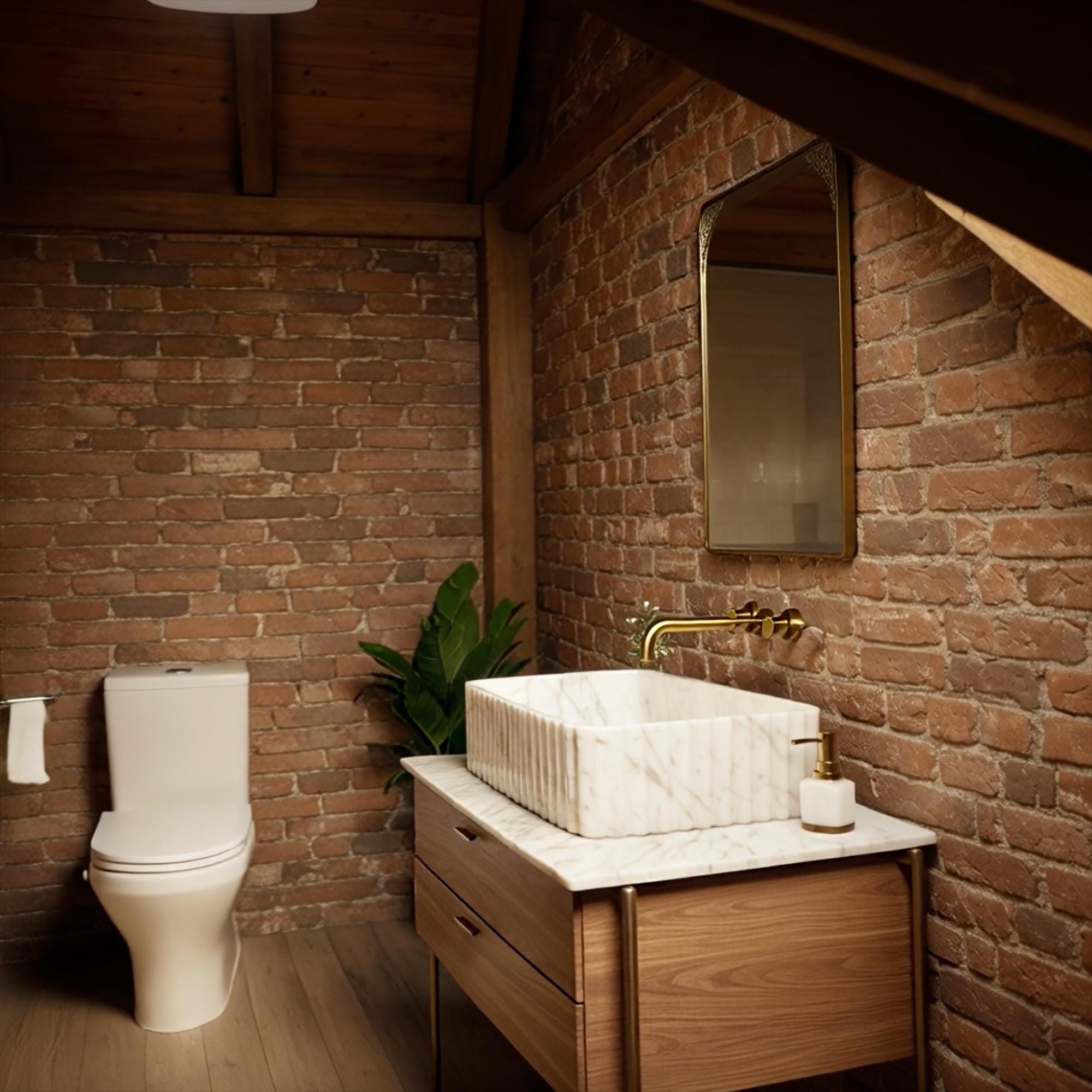 Fluted Carrara marble sink paired with walnut wood vanity and brick wall backdrop