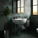 Carrara marble semicircular fluted sink with sleek chrome stand and integrated towel rail.
