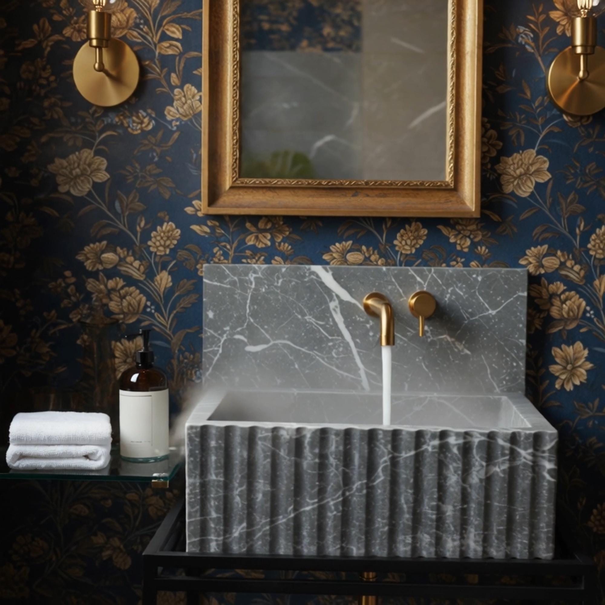 A fluted Pietre Notte marble sink with a matching integrated wall panel, bringing sculptural depth to high-end spaces.