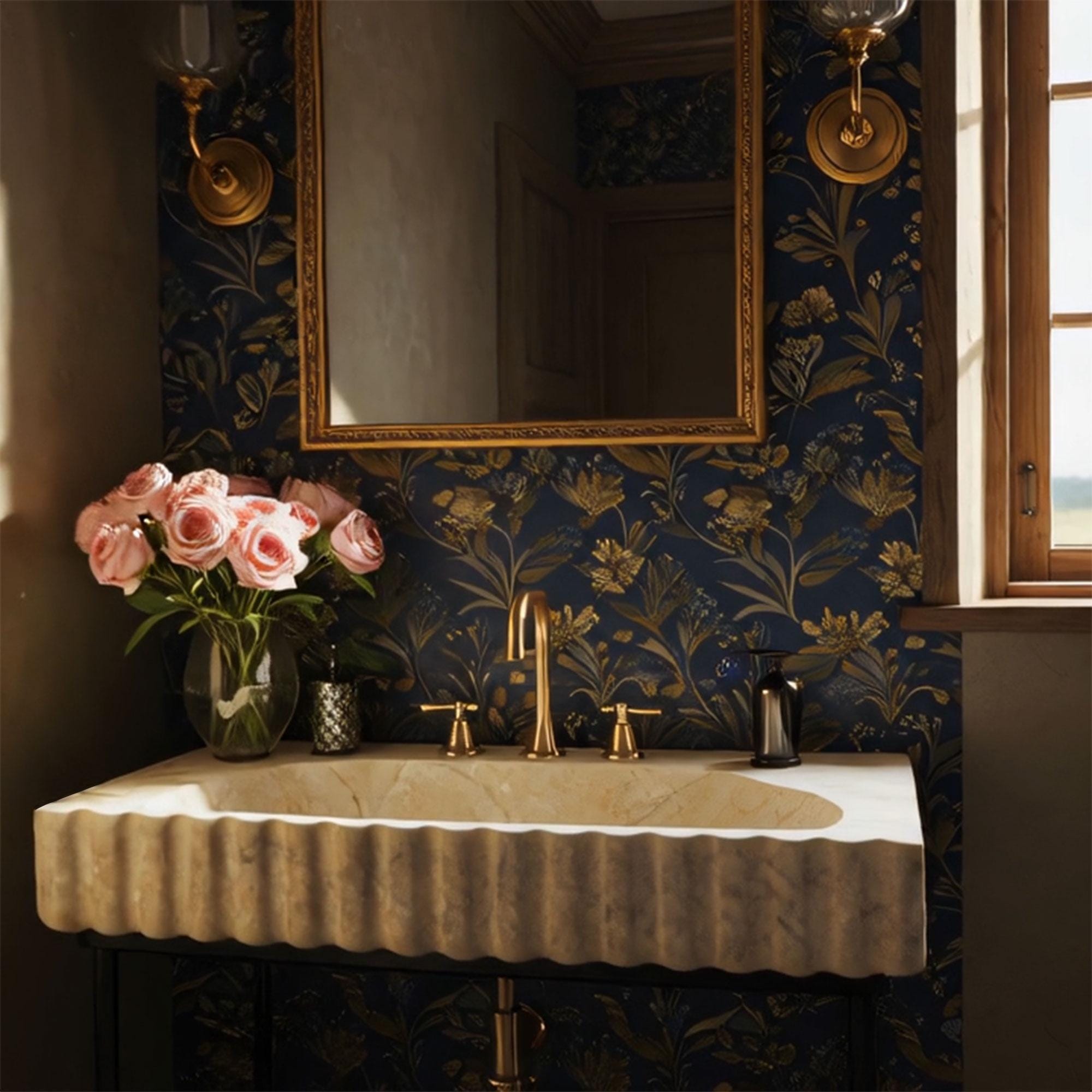 Elegant console sink in fluted beige travertine with handcrafted stonework and black metal base.