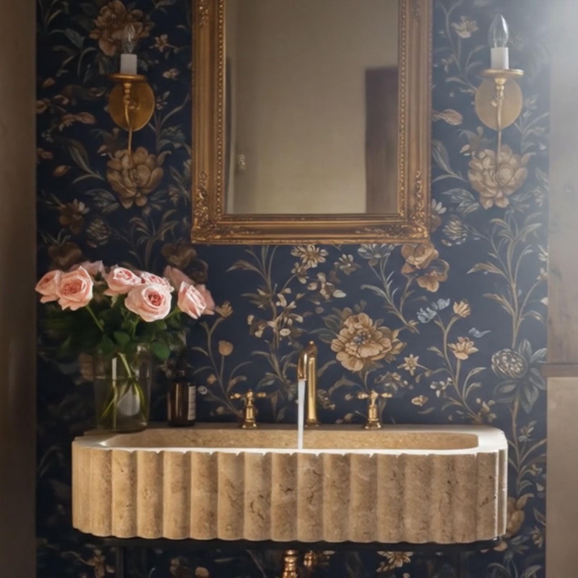 Luxurious hand-carved fluted travertine sink with black metal legs, perfect for vintage or contemporary bathrooms.