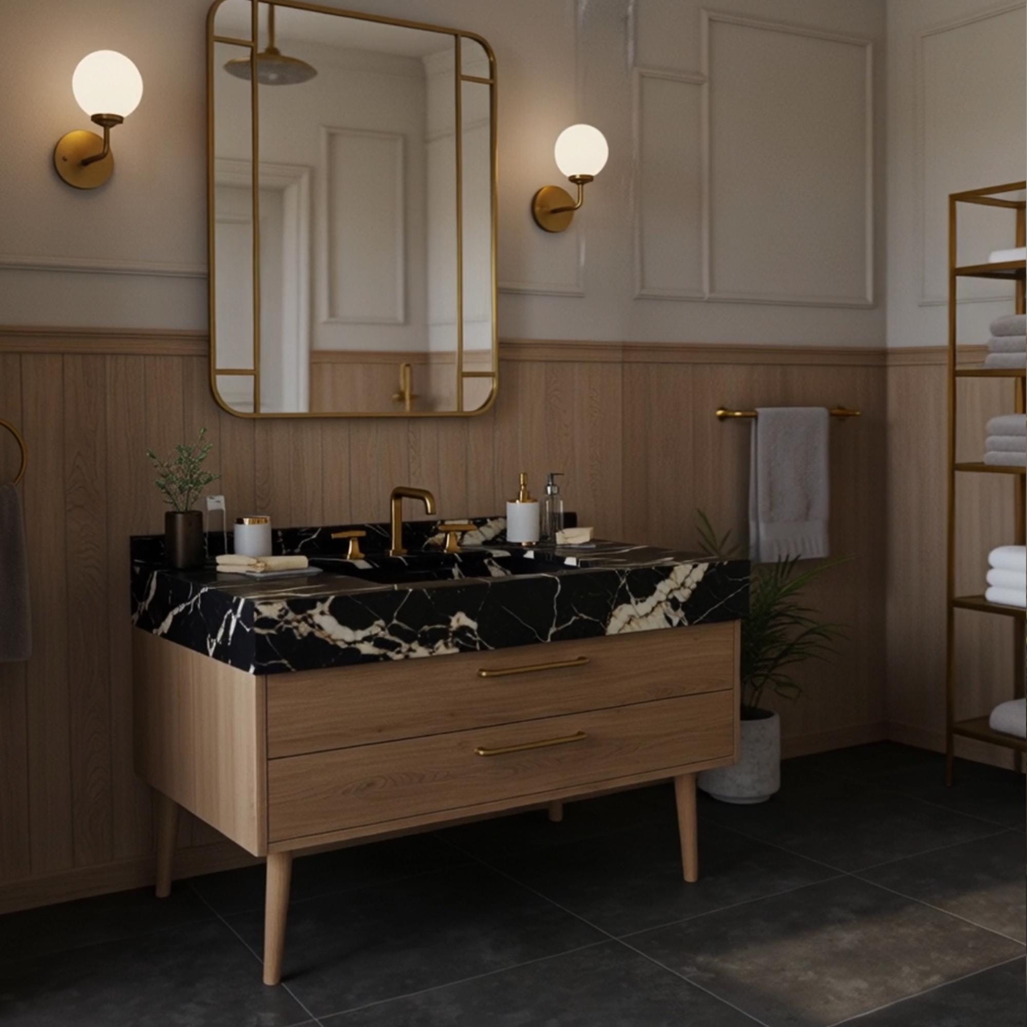 Bathroom vanity crafted from Nero Marquina marble and warm wood cabinet with brass hardware.