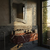 Rosso Levanto red marble floating sink with geometric edges and wall-mounted vanity design.