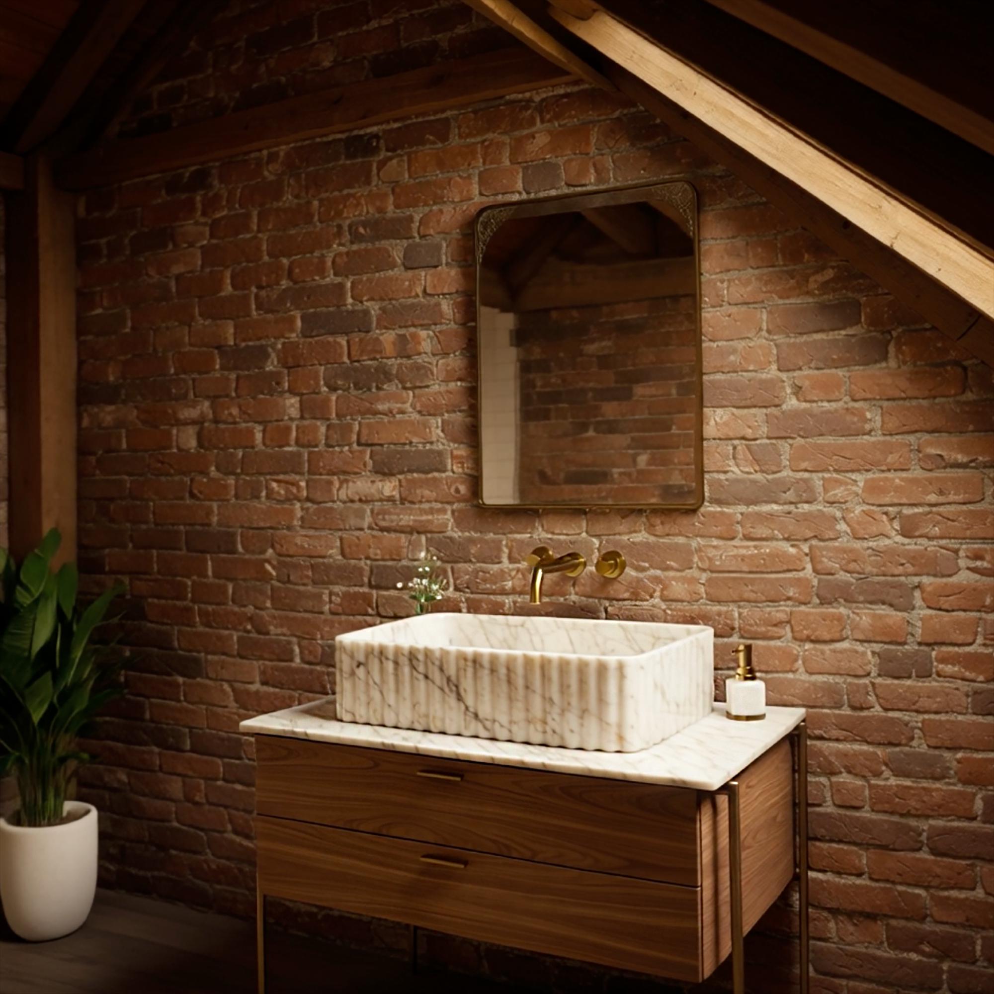 Rustic style bathroom with hand-carved Carrara marble vessel sink and brass fixtures