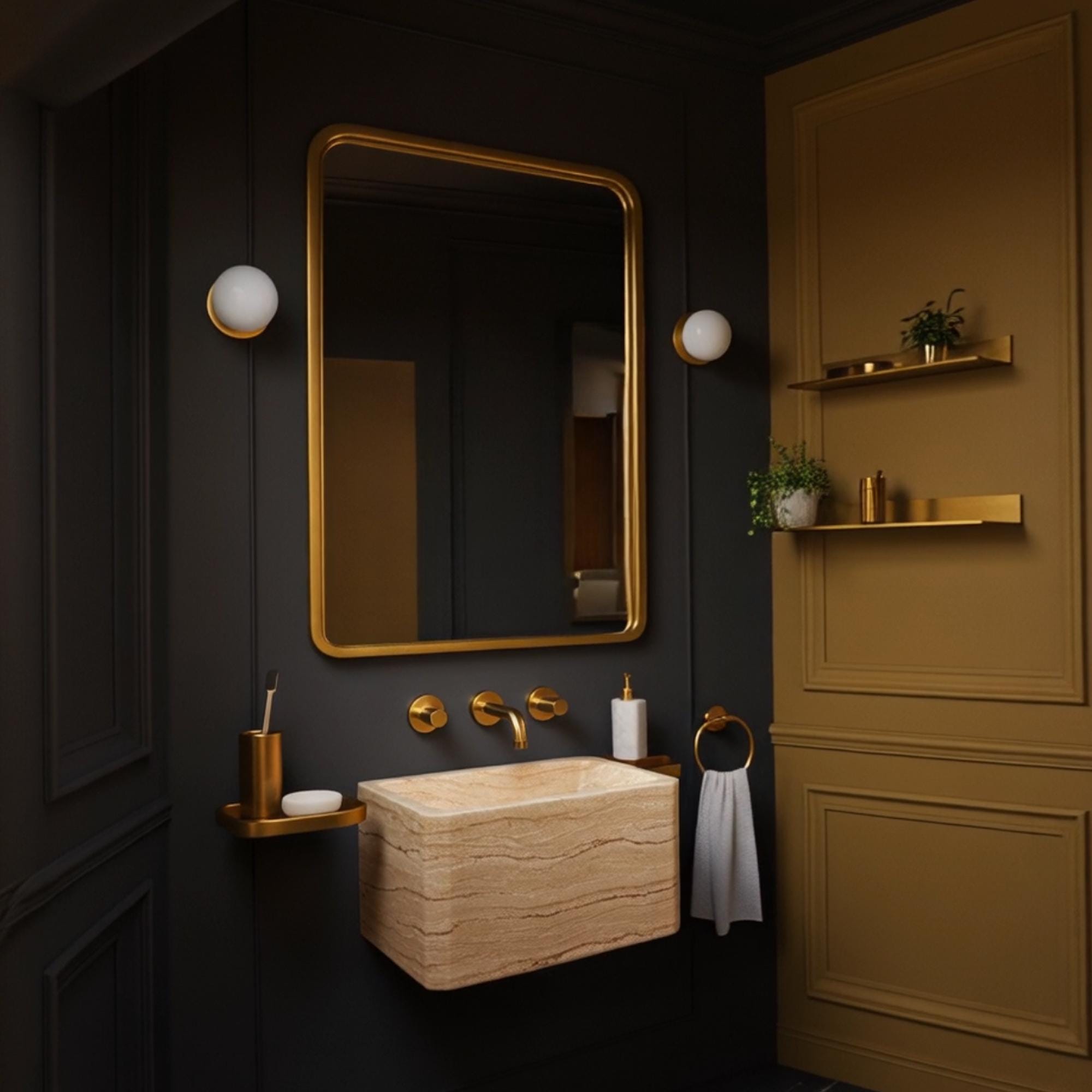 Minimalist vanity top with floating beige travertine sink and gold wall-mounted faucet.