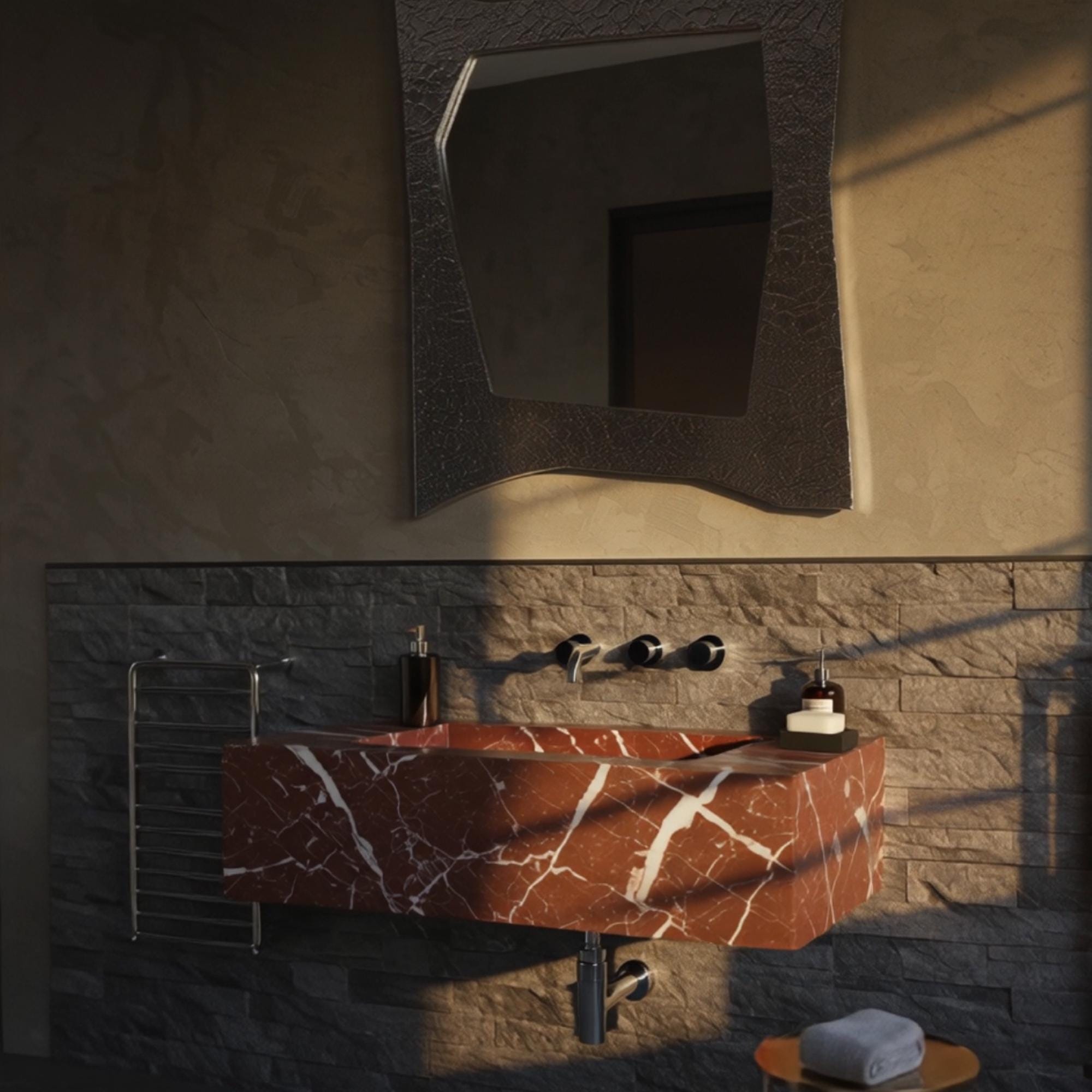 Wall-mounted red marble sink crafted from Rosso Levanto with clean, minimalist design.